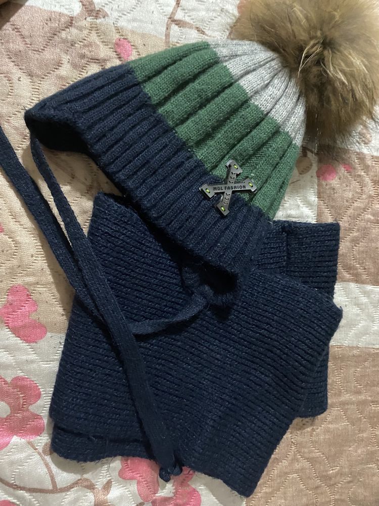 Продам зимнюю шапку на 3-5л.