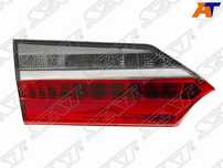 Фонарь в крышку багажника Toyota Corolla