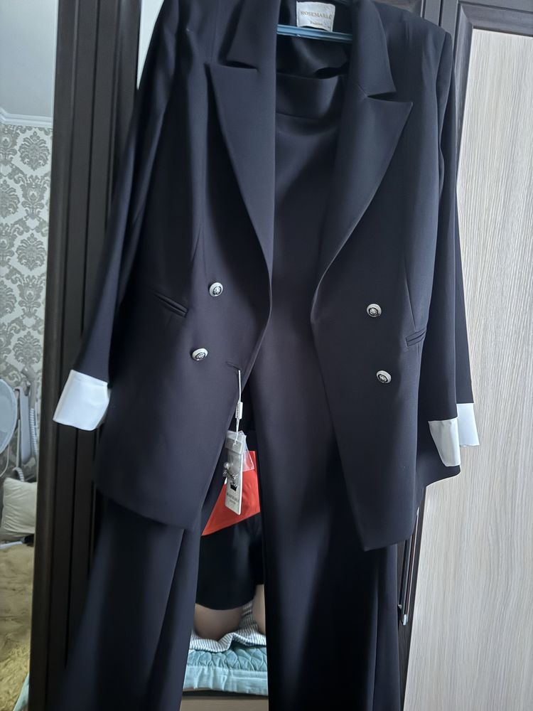 Продам брючный костюм новый р 48-50