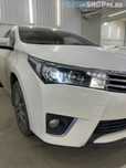 Стекло Фары Toyota Corolla 180