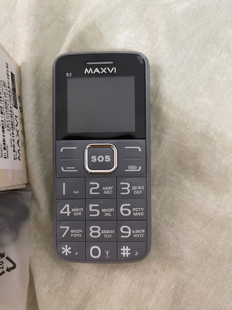 Сотовый телефон кнопчный Maxvi. Новый.