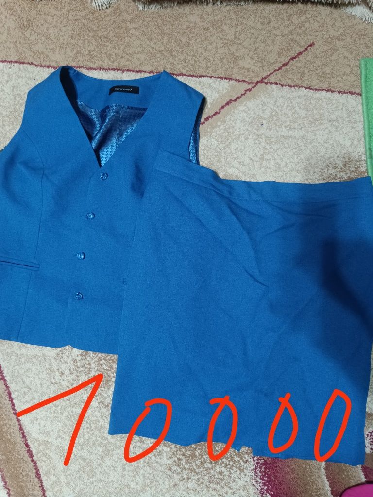 Продам костюмы и юбки