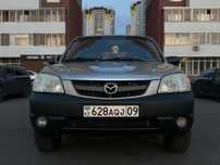 Продав Mazda Tribute 2002 г.