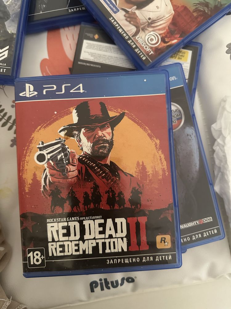 Продам игру на playstation horizon и red dead redemption 2
