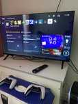 Продам ps 5 с телевизором + 2джойстика и игры.