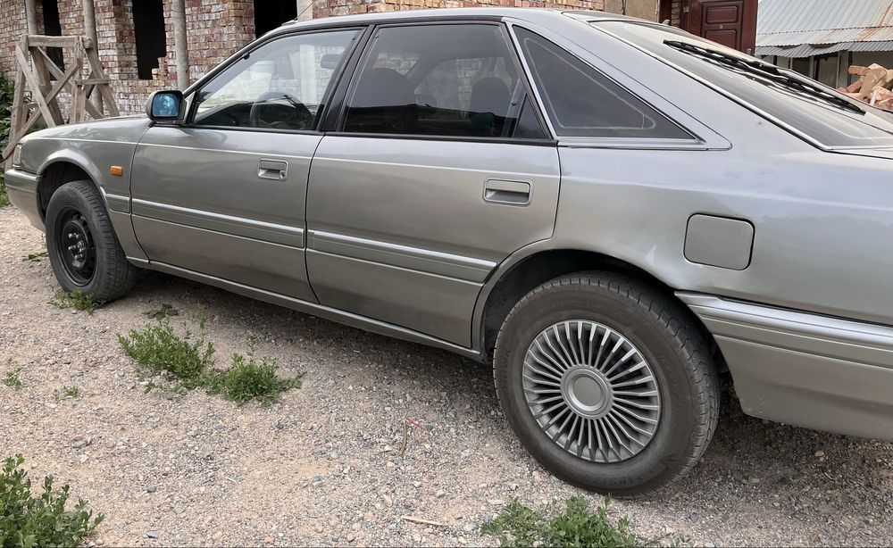 Машина Mazda 626