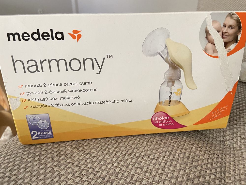 Medela  Ручной 2фазный молокоотсос harmoy