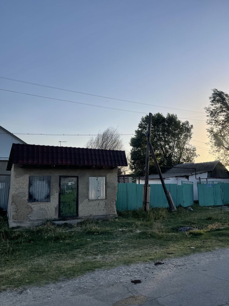 Дом с участком и магазином