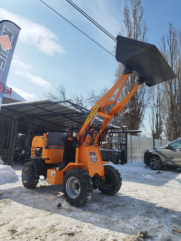 Мини погрузчик , минитрактор 25-30 л с