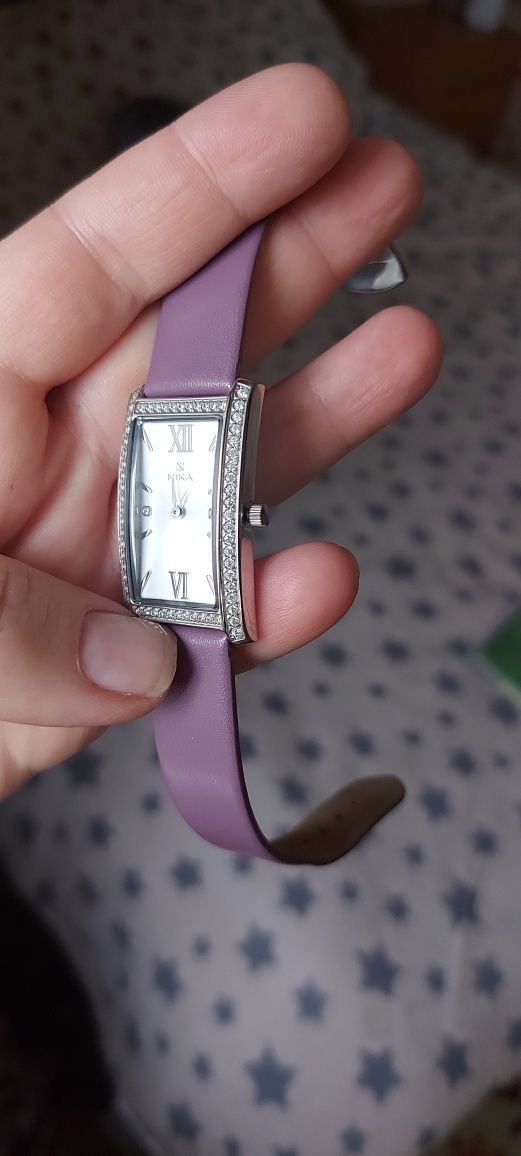 Серебряные часы Ника