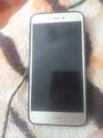 Продам Хуавей P8 lite,телефон,чехол,универсальное зарядное.