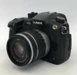 Panasonic Lumix GH5 вместе с объективом Lumix 14-140mm f/3.5-5.6 ASPH