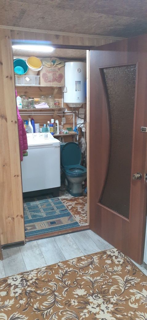 Дачный участок.с домом и постройками.