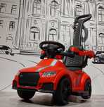 Толокар "Mega Car" с родительской ручкой и боковыми поручнями. Kaspi