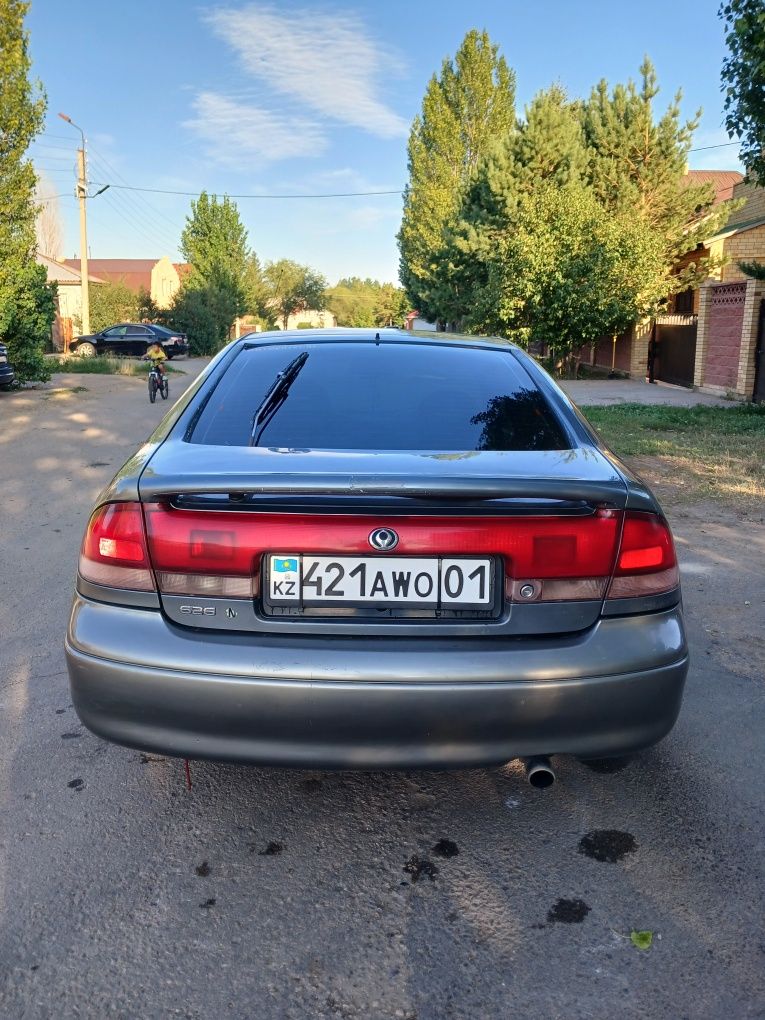 Мазда кронос в хорошем состояний