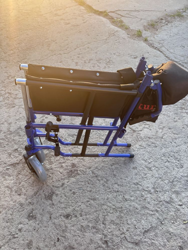 Продам инвалидную коляску состояние новое