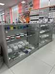 Продам торговые стелажи витрины и офисную мебель
