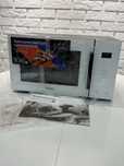 Продам микроволновую печь Samsung MG23T5018A