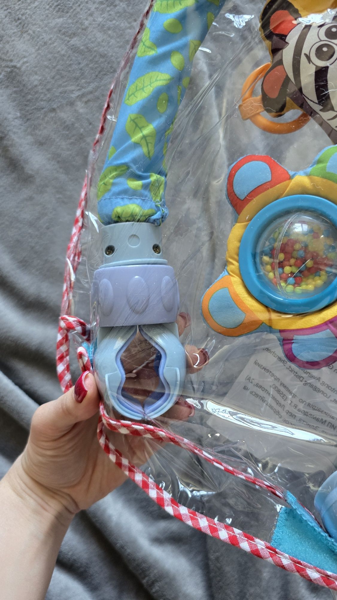Игрушка на коляску
