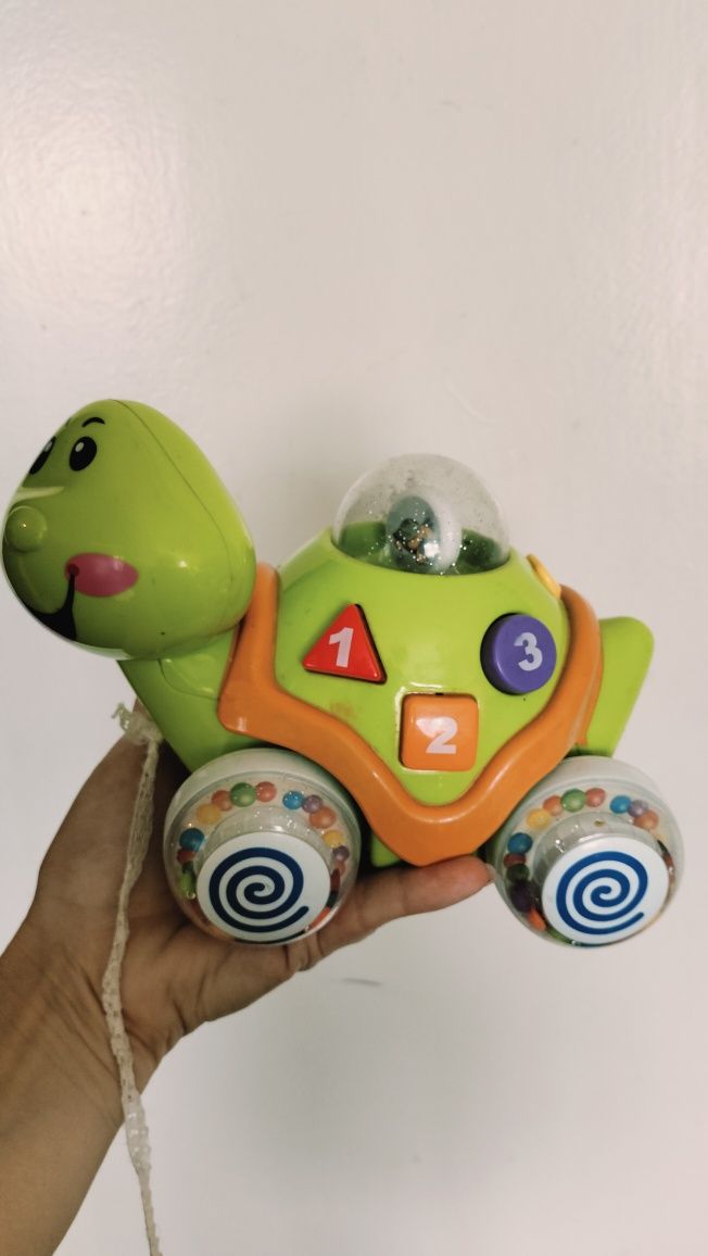 Детская игрушка каталка