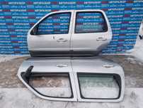 Двери на mazda tribute.