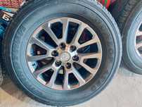 б/у комлект летних шин с титановыми дисками 265/65 R17.