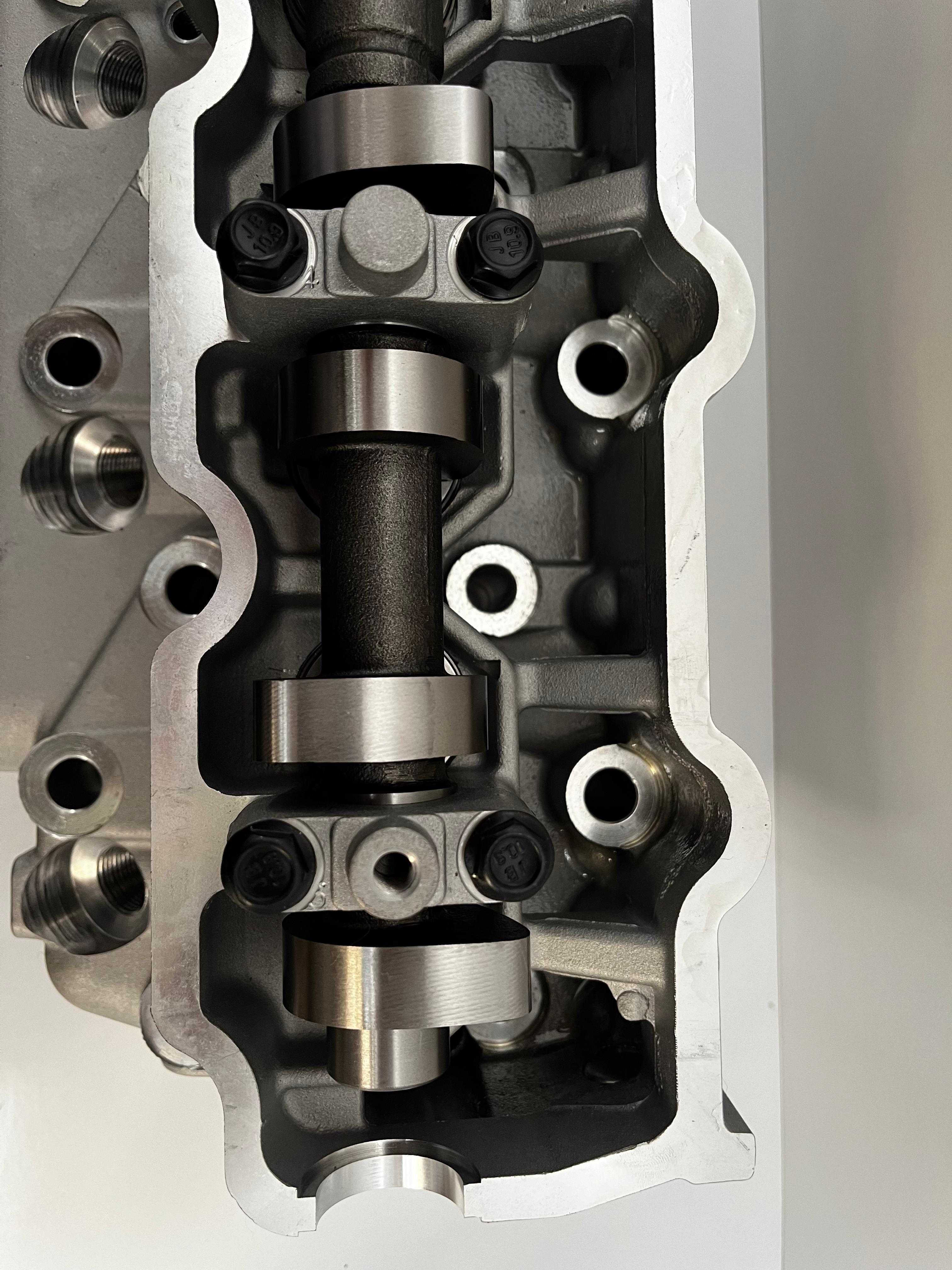 Головка блока сборе на Toyota 3RZ катушка