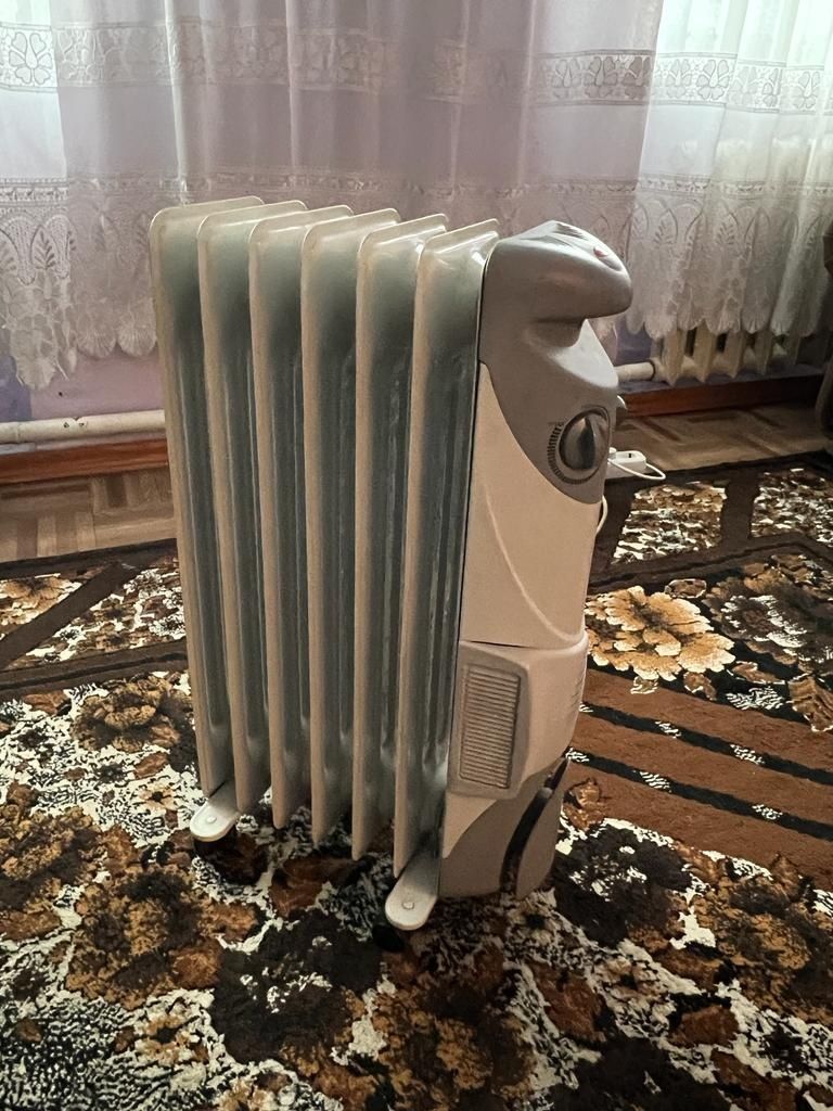 Маслянный обогреватель