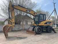 Экскаватор Caterpillar