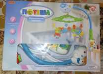Продам игрушку подвесную на монежку.