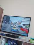 PS 3 с телевизором и два джостика