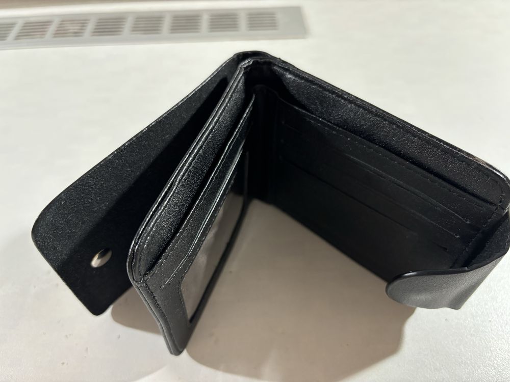 Продам новый портмоне hugo boss черный