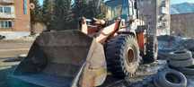 Продам погрузчик Hitachi LX 230