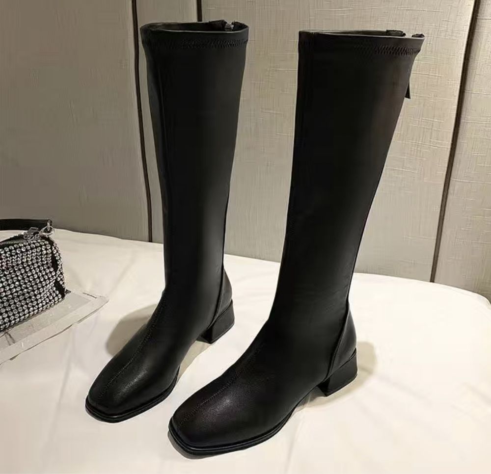 Продам новые осенние сапоги черные