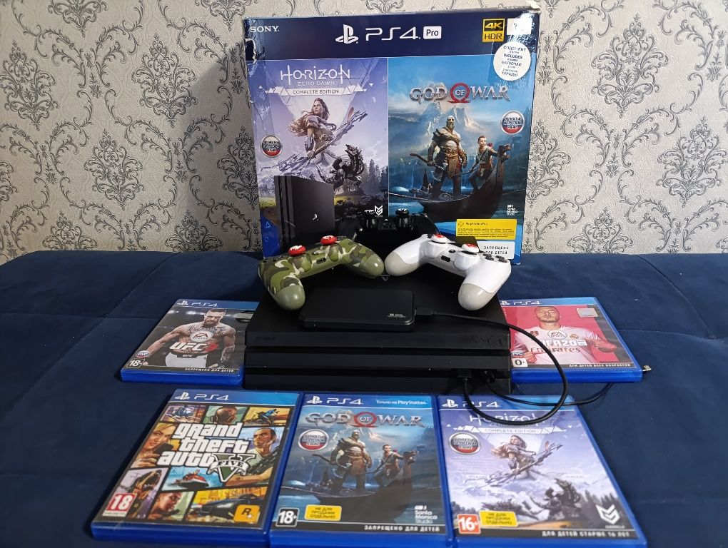 PlayStation 4 Pro 1TB + игры на дисках и в цифровом