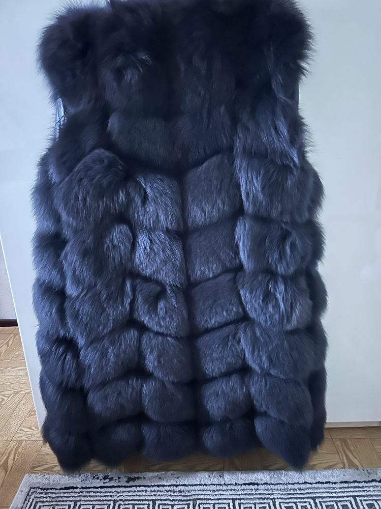 Меховая жилетка