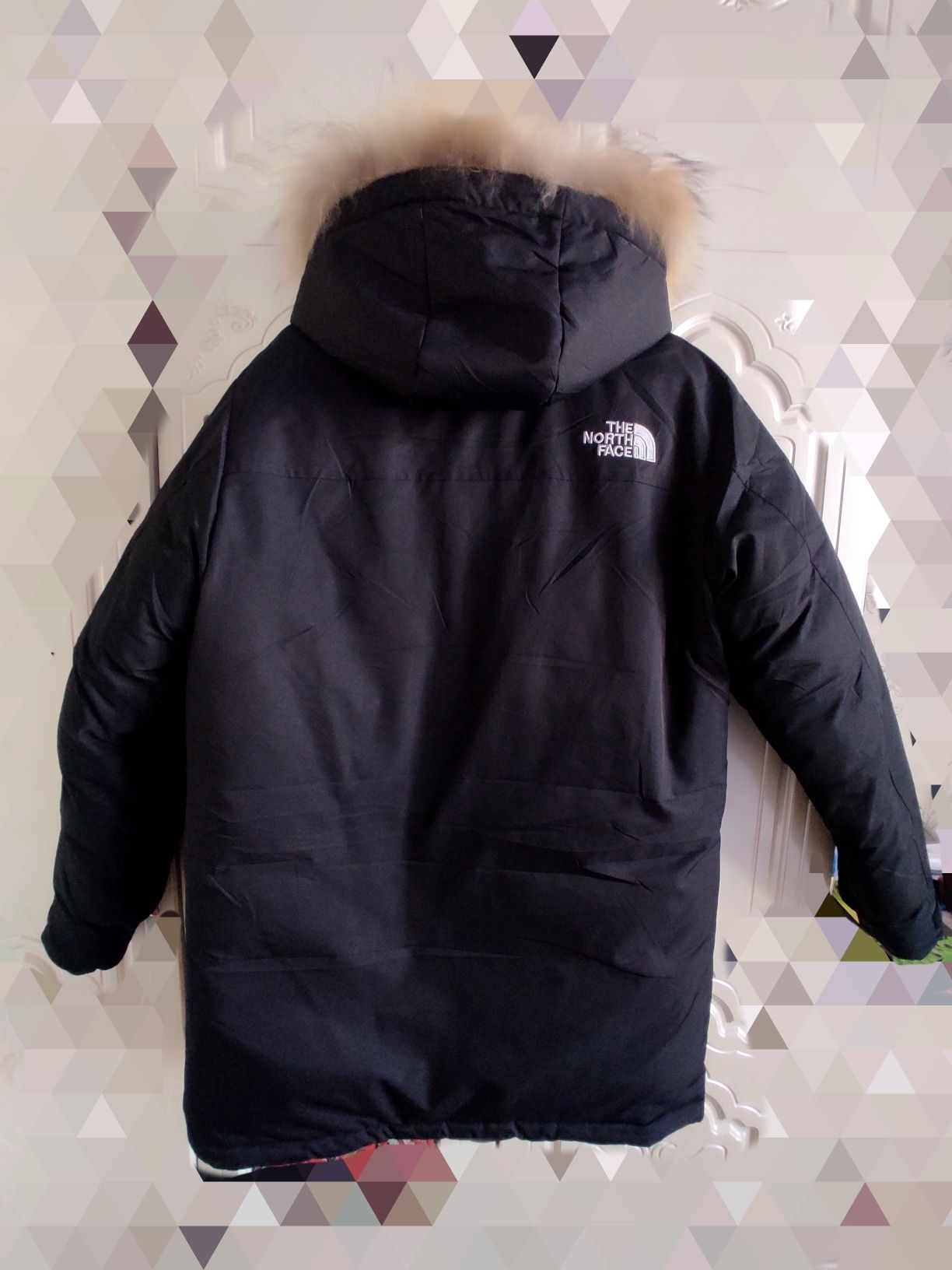 Продам пуховик The north face