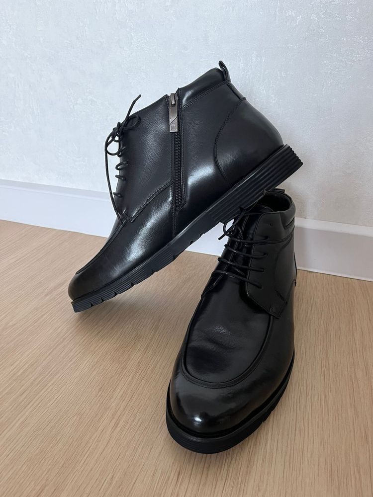 Продам новые зимние ботинки