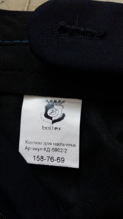 Школьный костюм новый 158см