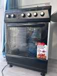 Новый газовая плита с духовкой бренда Magic Chef