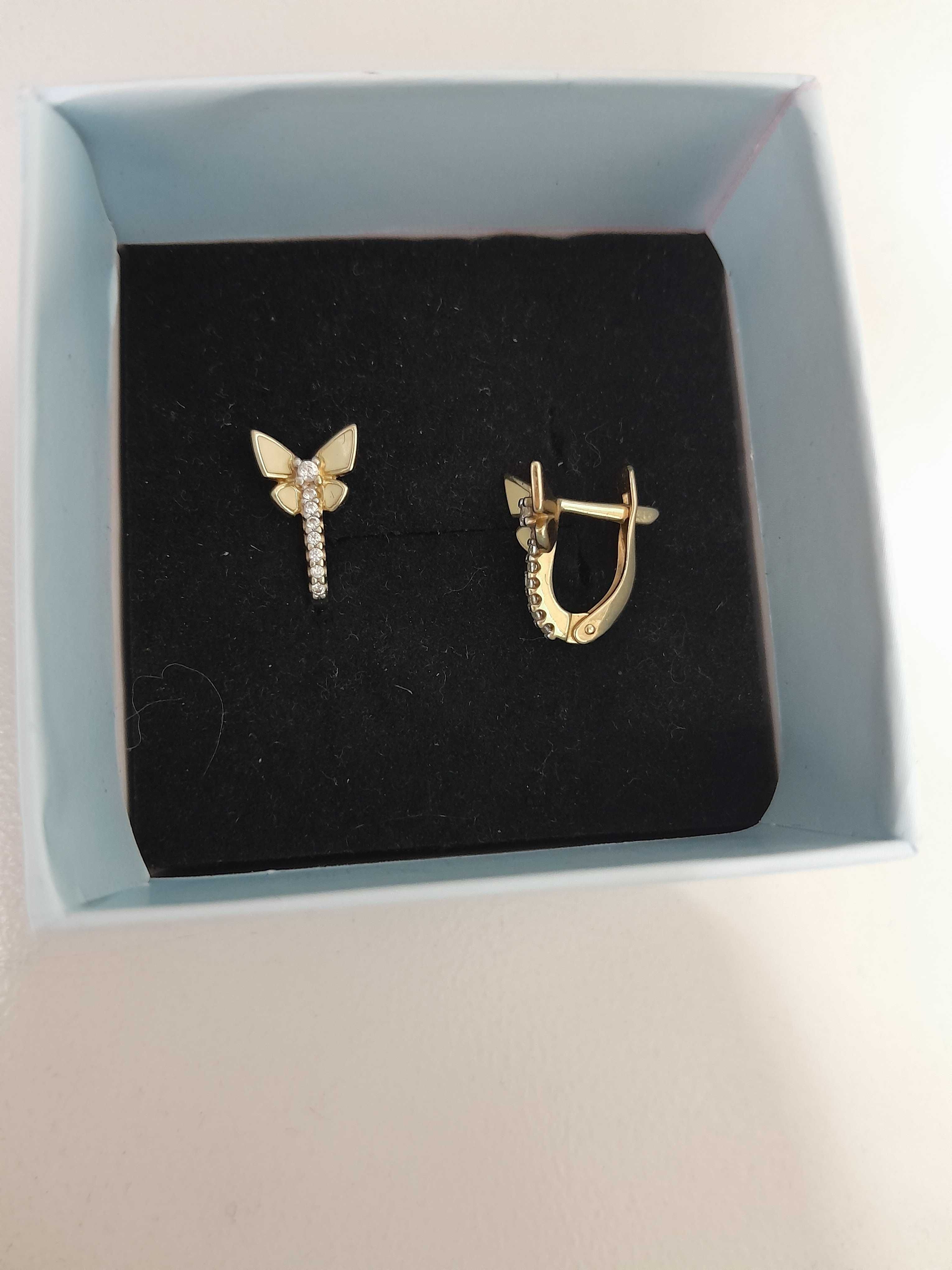 Продам золотые серьги