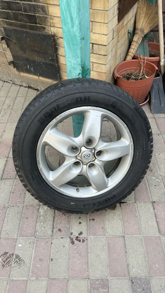 Диски оригинальные на Порше Каен с шинами Pirelli
