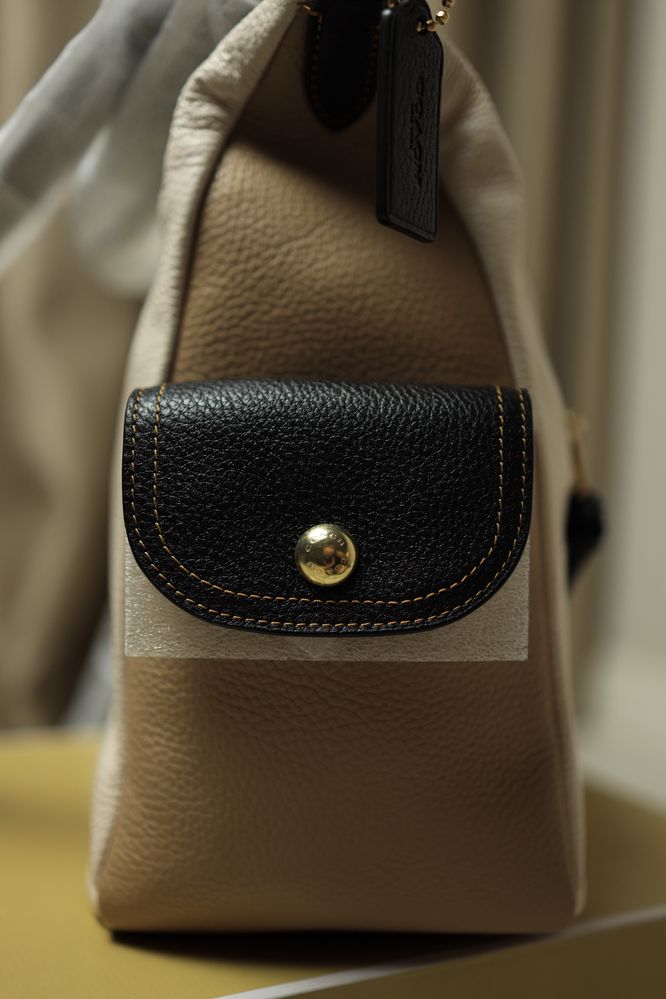 Продам новую кожанную сумку Coach