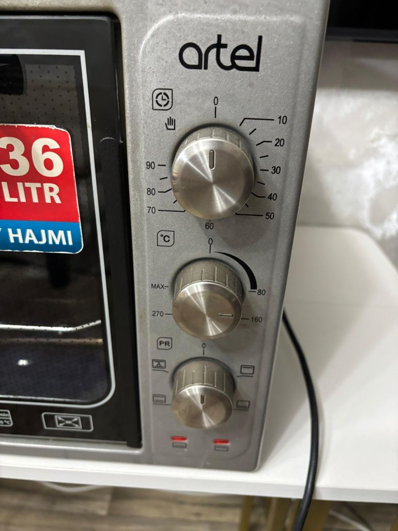 Продам настольную электропечь Artel