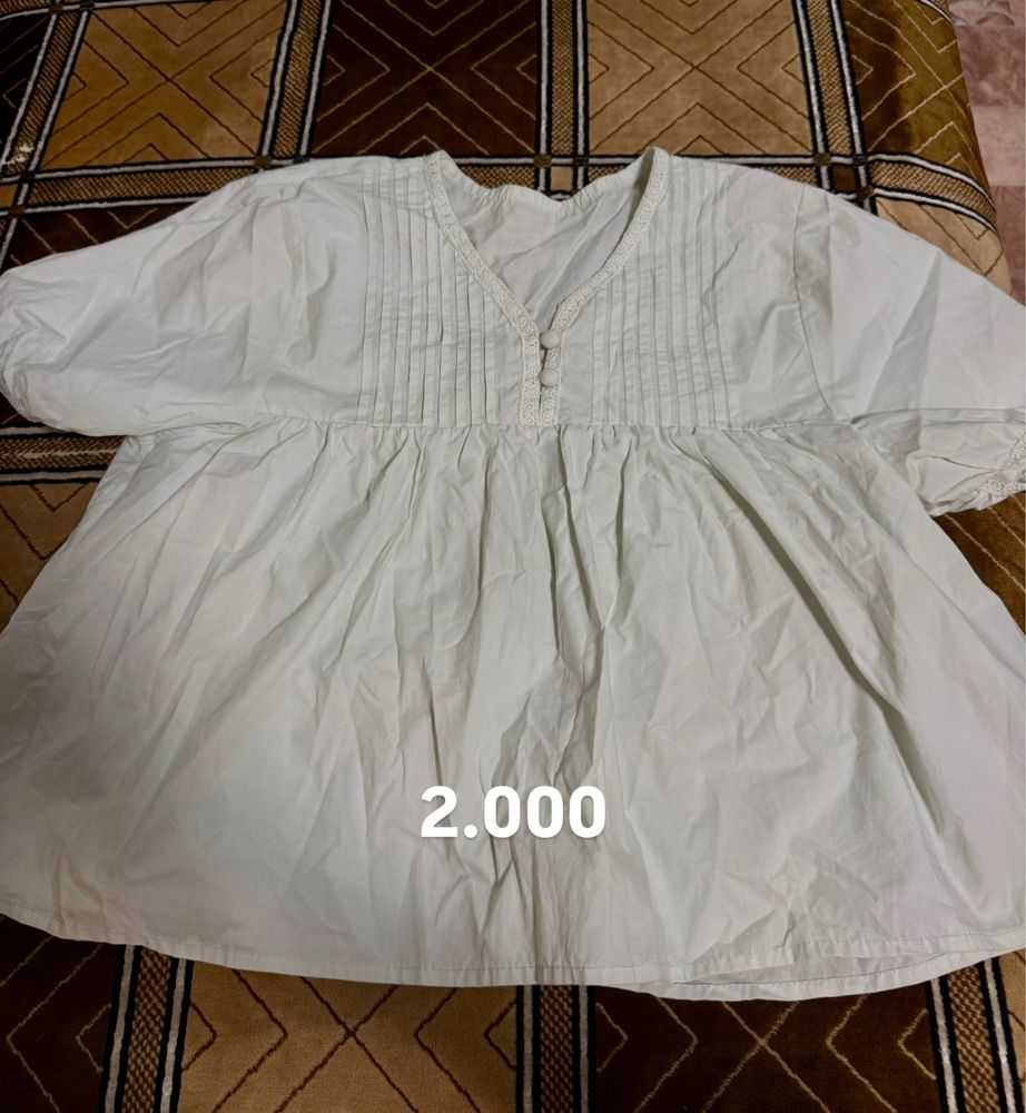 Женская одежда по 2.000