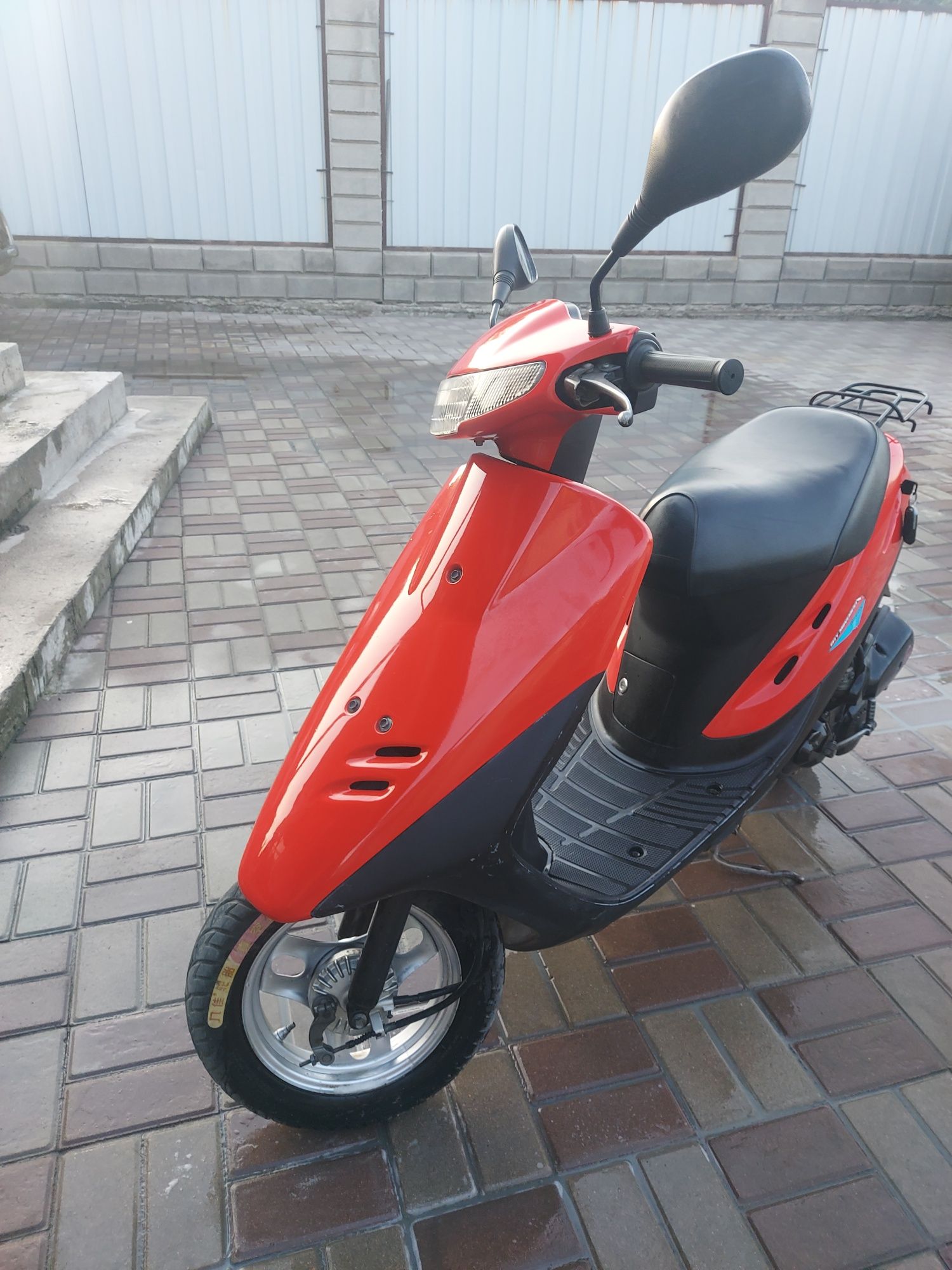 Продам Хонда  Дио в отличном состоянии  сигнализация авто завод  .