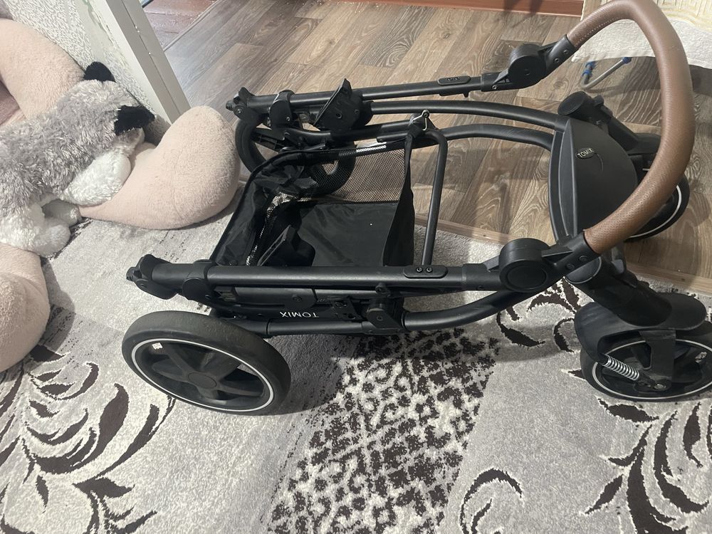 Продам  детскую коляску TOMIX 3 в 1