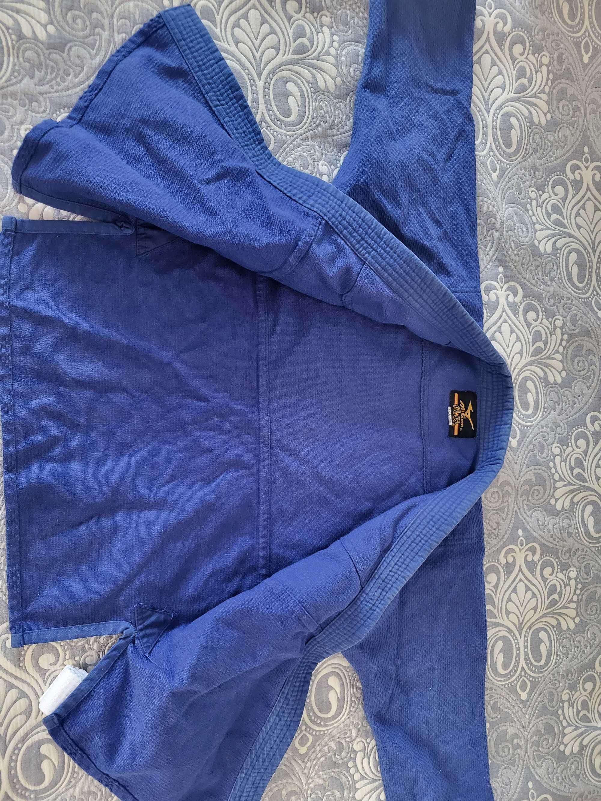 Продам кимано синего цвета, размер 130