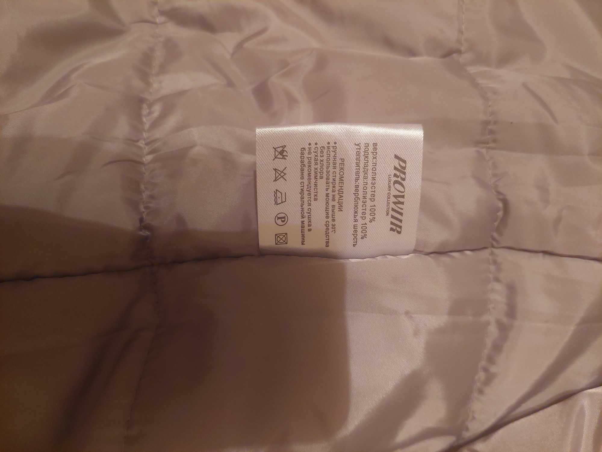 Продам новый зимний пуховик (пальто)