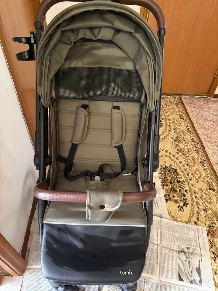 Продам прогулочную коляску Tomix Kelly